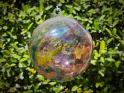 glass Christmas ornament with ash orange